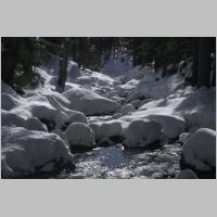 rocks_in_river_covered_in_snow.JPG